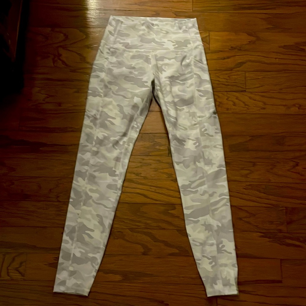 White / grey camo tights.